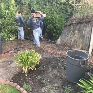 Old fence sections are disposed of