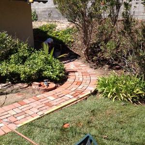 The new path into the garden has been laid