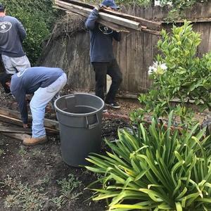 Old fence sections are disposed of